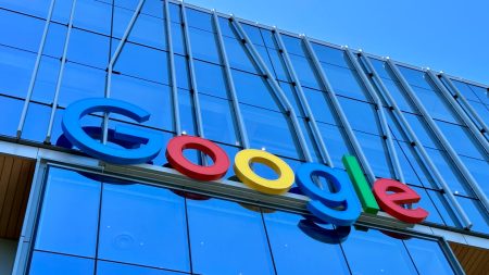 the google logo is displayed on the side of a building