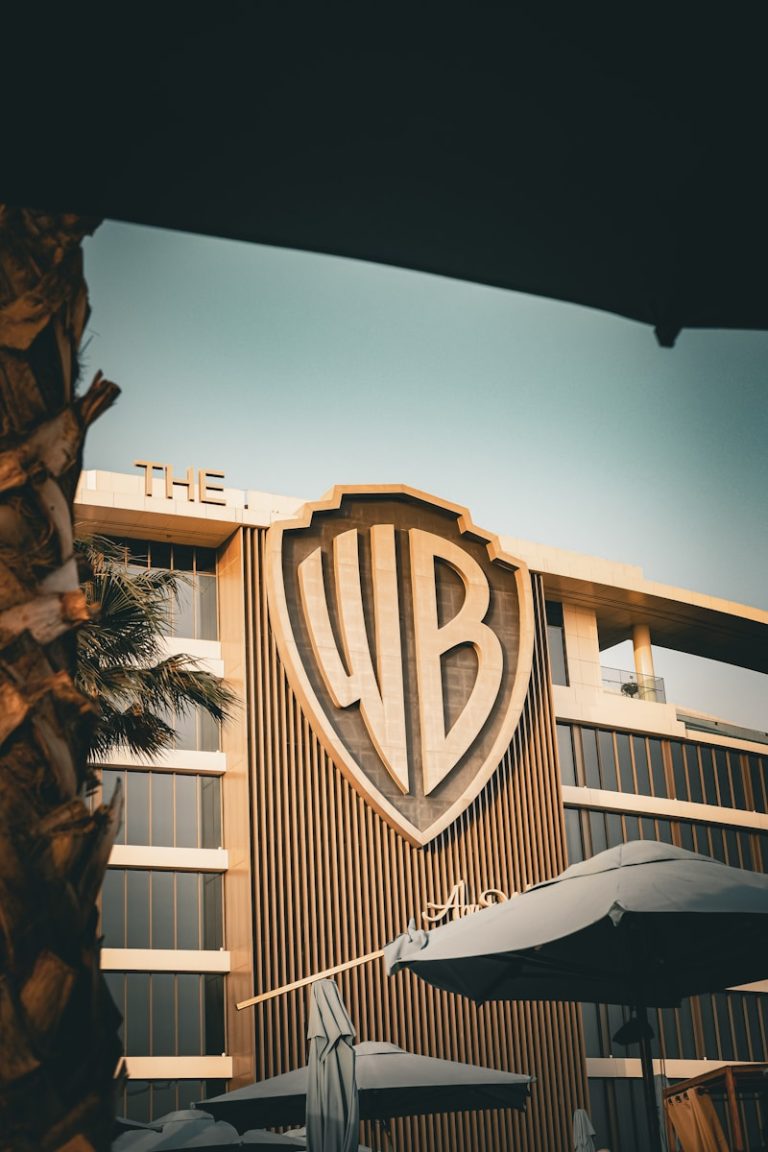 A picture of a building with a logo on it